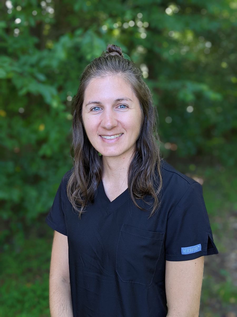Cara Crawford, licensed acupuncturist, smiling outdoors